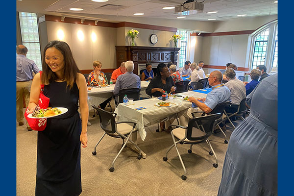 Carolyn Glass, MD, PhD, in front, with awardees enjoying lunch