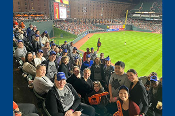 Group photo of AAPA Volunteers at baseball game