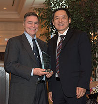 Fred Sanfilippo, MD, PhD, (left), Jiaoti Huang, MD, PhD, (right) at Pathology Resident Graduation Ceremony in 2017