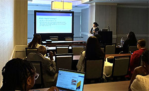 Natalya Ramirez, MD, at podium