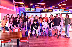 Group at bowling alley, Left to right, Back:  Mastrodomenico ('10), Wilmoth, Allison, Hays, Turner, Gill, Gielczynski, Lomas, Miller, Ho, Chen (’19), Shere, Pyron (’24), Robinson (’26). Front: Irwin, Mahan ('23), Tomsho, Johnson (’99), Yu, Hague, Quiney, and Ganci