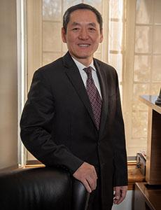 Pathology Chair Jiaoti Huang Standing