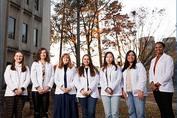 Left to right: Andrea Wilson, Kelsie Schiavone, Tara Richbourg, Olivia Fay, Kelly Yunsol Jo, Vianna Martinez, Asjah Wallace
