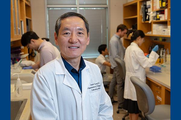 Dr. Jiaoti Huang in his lab