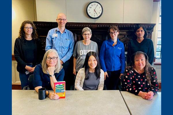 Book club attendees: Back row left to right: Rachel Factor, William Jeck, Susan Watson, Emily Knutson,  Avani Pendse. Front row left to right: Anne Buckley, Wen-Chi Foo, Sherry Harrell. (not pictured: Jamie Botta)