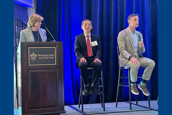 Dean Mary  Klotman, with Drs. Jiaoti Huang and Daniel George presenting