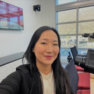 Xiaoyin "Sara" Jiang, MD, FCAP, snaps a selfie before presenting her course