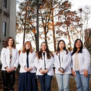 Left to right: Andrea Wilson, Kelsie Schiavone, Tara Richbourg, Olivia Fay, Kelly Yunsol Jo, Vianna Martinez, Asjah Wallace