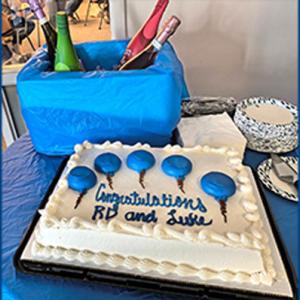 Cake that says congratulations RD and Lucas