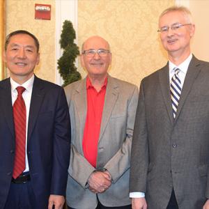 Drs. Huang, Borowitz, and Cummings at the event